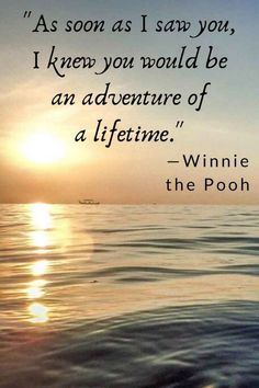 the sun setting over water with a quote from winnie pooh