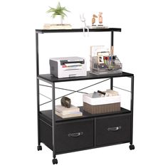 a black shelf with two drawers and baskets on top