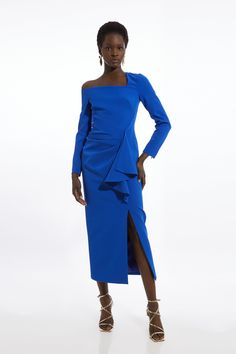 Feel Formal In Our Midi Dress, Which Boasts A Figure Hugging Fit, A Unique, Asymmetric Neckline Which Exposes A Shoulder, And A Draped Accent At The Hip. Style It With Court Heels Or Ankle Boots For A Look That Will Take You From Date Nights To Dressy Evenings. Stretch Crepe Asymmetric Neckline Draped Maxi Dress High Quality Stretch Fabric Figure Hugging Bodice Straight Fit Skirt Statement Draped Hip Accent Unique Asymmetric Neckline Thigh High Leg Split One Shoulder Design Zip Fastening In Back Bride Jumpsuit, Petite Wedding Guest Dresses, Draped Midi Dress, Plus Size Workwear, Summer Bridesmaid Dresses, Fit Skirt, Drape Maxi Dress, Draped Midi Dresses, Leg Split