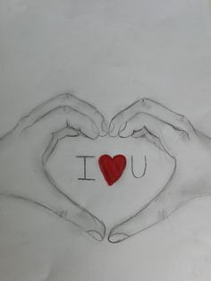 two hands making a heart with the word i love you