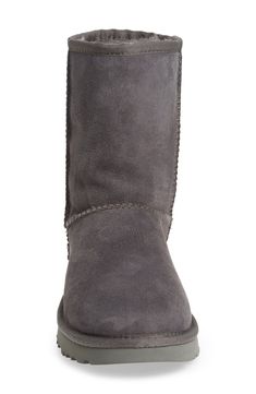 Pretreated to protect against moisture and staining, this timeless UGG boot is comfier and cozier than ever, with a soft lining crafted from genuine shearling. The Treadlite sole adds increased cushioning, durability and traction on both wet and dry surfaces. Style Name:UGG Classic Ii Genuine Shearling Lined Short Boot (Women). Style Number: 5179825. Winter Sheepskin Boots With Leather Lining, Sheepskin Boots With Round Toe For Cold Weather, Sheepskin Boots For Cold Weather With Round Toe, Classic Boots With Sheepskin And Suede Lining, Classic Sheepskin Boots With Suede Lining, Sheepskin Ankle Boots With Suede Lining, Classic Shearling Boots With Round Toe, Casual Shearling Boots With Plush Lining, Classic Sheepskin Boots For Fall