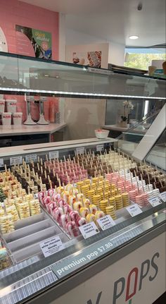 a display case filled with lots of different types of food