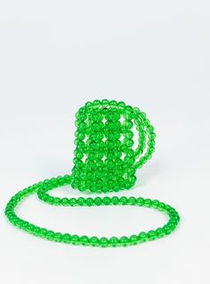 Crossbody bag  100% plastic beads  Transparent beads   Single strap   One main compartment   Length strap to base: 63cm / 24.8"  Length bag only: 10.5cm / 4.1"  Width bag only: 8cm / 3.1" Beaded Crossbody Bag, Festival Accessories, Festival Bag, Bag Green, Dress Orange, Mini Handbags, Beaded Bags, Wallet Bag, Plastic Beads