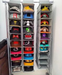 several hats are lined up in the closet