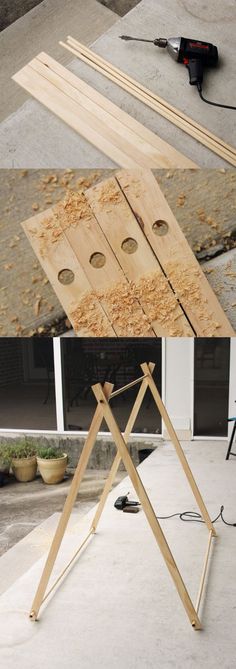 a wooden easel sitting on top of a cement floor