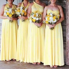 the bridesmaids are all wearing yellow dresses