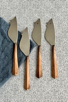 Set of 4 stainless steel Ratoncito mouse-shaped cheese spreader knives in the Ridge copper design. A great gift for cheese lovers that like to entertain! Artisan Cheese, Gift Photo