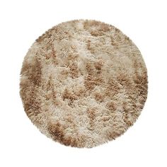 a round rug with white and brown shaggys on the bottom, in front of a white background