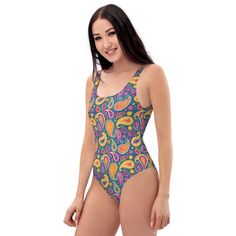 Inspired by the iconic Indian teardrop-shaped motif, our one-piece swimsuit is a chic addition to your beach wardrobe! Featuring vibrant shades of purple, yellow, blue, and pink, it's a contemporary interpretation of traditional Paisley design. Make a statement by the shore while paying homage to the rich heritage of Indian culture!This one-piece swimsuit for all figures will bring out your best features. Enjoy the smooth fabric and the flattering design, and show it off by the sea or pool! Country Wall Clock, Beach Wardrobe, Make Waves, Indian Culture, Decorative Blankets, Swimsuits For All, Paisley Design, Crop Sweatshirt, Blue And Pink