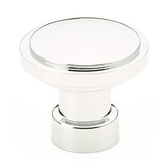 an image of a white knob for a cabinet or cupboard door on a white background