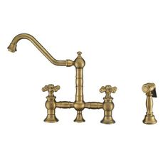 an antique brass faucet with two handles