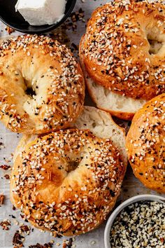 sesame seed bagels with butter and poppy seeds