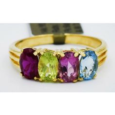 Gemstone Type : 1 Created Ruby, Peridot, Pink Sapphire & Blue Topaz Total Ct Weight : 1.80 Carats No Inclusions Or Flaws 14k Yellow Gold Size 6.75 (Free Resizing Service - If Needed) Net Weight : 2.9 Grams Type Of Setting : Prong Shape Of Gemstones : Oval Gold Oval Ring, Silver Eternity Ring, Raw Diamond Rings, Raw Diamond Engagement Rings, Rock Rings, Opal Diamond Ring, Big Stone Ring, Criss Cross Ring, Rough Diamond Ring