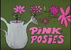 pink posies are in a white watering can with flowers on the bottom and green background