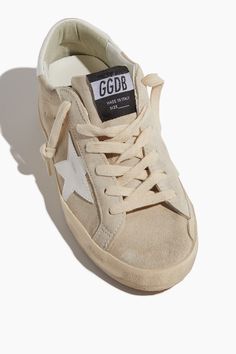 The Golden Goose Super Star Sneaker are a must-have addition to your sneaker collection. This sneakers feature their signature distressing and star in suede. FIT DETAILS Low profile sneaker Lace up Distressing Leather upper Rubber sole The Golden Goose, Champagne Blonde, Fresh Outfits, Fit Details, Star Sneakers, Super Star, Lacing Sneakers, Seed Pearl, Distressed Leather