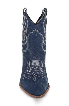 Decorative stitching and side pull-tabs lend Western-inspired elements to a trend-savvy bootie balanced by a pointy toe and block heel. 2 1/2" heel 5 1/2" shaft Leather or textile upper/leather lining and sole Made in Italy Western Denim Blue Boots For Fall, Denim Blue Western Boots For Fall, Western Style Denim Blue Boots For Fall, Western Boots With Round Toe In Denim Blue, Denim Blue Western Boots With Round Toe, Denim Blue Pointed Toe Denim Boots, Western Style Denim Blue Boots With Round Toe, Denim Ankle Boots For Fall, Denim Blue Pointed Toe Boots