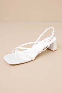 Subtly sultry and always chic, the Lulus Kerrie White Satin Strappy Low Heel Sandals will add a luxe to touch to any ensemble! Sleek woven satin shapes these unforgettable heels that have a square footbed, a thong-style upper, and a network of slender straps throughout. A matching, adjustable slingback strap secures with a shiny gold buckle, all atop cute block heel. 2" wrapped block heel. Cushioned insole. Felted rubber sole has nonskid markings. Man made materials. Imported. Lulus | Kerrie Whi White Strappy Heels, White Sandals Heels, Low Heel Sandals, Sandal Heels, Low Heel Shoes, Black Sandals Heels, Heel Sandal, Fashion High Heels, Slingback Sandal