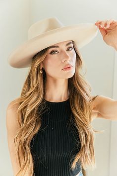 Our newest hat obsession. The Beverly! We'd wear this hat every day if we could. Impeccable quality, a turned up pencil brim, super structured, and adjustable inner-band. Modern, will last forever, and adds a little bit of cool to any look. Rancher style hat with some edge. Makes every outfit look better, we promise. Embellished with Swarovski crystals on the side, this hat is designed to make a statement, prepare for endless compliments! Satin lined on the inside, very luxe Wider brim than your Trendy Curved Brim Felt Hat For Everyday, Trendy Flat Brim Fedora For Everyday, Trendy Felt Hat With Curved Brim For Everyday, Trendy Fedora Hat For Everyday, Trendy Adjustable Fedora For Everyday, Solid Color Brimmed Hat For Everyday, Beige Flat Brim Fedora For Everyday Wear, Trendy Flat Brim Felt Hat For Everyday, Everyday Beige Fedora With Flat Brim