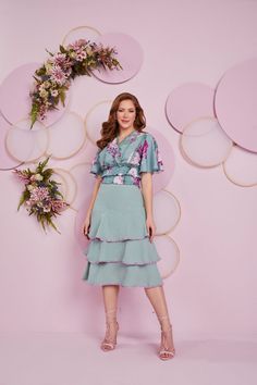 This stunning Vintage Rose Set is perfect for special occasions and making a lasting impression. The complementary colors and coordinated details create an elegant, timeless look with a touch of luxury. An exquisite floral top in a medium shade of aquamarine transitions seamlessly to the contrasting purple print. The smocked waist band creates a flattering figure that is suitable for every figure. To tie the outfit together, lilac guipure accents are featured at the ruffled hem. Color: Aquamarine/Lilac *Fit varies by brand. Always check Sizing Tab for reference. Details -V neckline -Smocked top -Wide sleeves -A-line silhouette -Back zipper -Ruffled hem -Midi length -Lined Material and Care -100% Cotton -Lining 100% Polyester -Hand wash -Imported Romantic Fashion, Modest Outfit Ideas, Smocked Top, Vintage Rose, Fashion Over 40, Complementary Colors, Romantic Style, Fashion Over 50, 50 Fashion