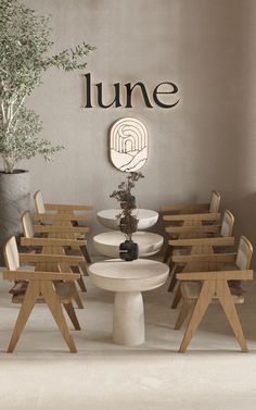 the dining room table is made out of plywood and has chairs arranged around it