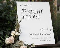 a welcome sign with flowers on it for the guests to come home from their wedding