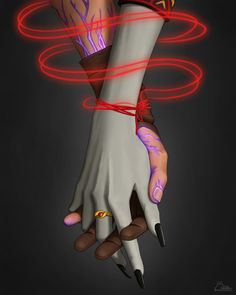 a woman's hand with red lights on her wrist and ring around the wrist