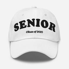 Celebrate your journey and show off your senior pride with our Seniors Class of 2025 Embroidered Cap! Perfect for the soon-to-be graduates, this cap is a must-have for high school seniors who are ready to take on the world. Whether you're gearing up for graduation, making memories at senior events, or just want to represent your class in style, this hat has you covered. Crafted with premium materials and featuring bold embroidery, this cap is both stylish and durable--just like the Class of 2025! It's designed to be your go-to accessory for all the senior year milestones, from the first day of school to the big walk across the graduation stage. Key Features: Proudly Represent: The bold "Seniors Class of 2025" embroidery makes a statement, letting everyone know you're part of a special clas College Letter Print Cap, Classic White Hats With Letter Print, Adjustable Hats With Letter Print For Graduation, White Dad Hat With Letter Print For Sports Events, Adjustable White Hats For Graduation, Adjustable White Hat For Graduation, Customizable White Dad Hat, Cap Graduation, Class Of 2025