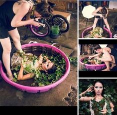 a woman is in a pink tub with plants around her, and another girl sits on the ground