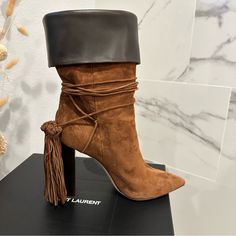 Saint Laurent Tanger 105 Tassle Boots In Brown Suede With Leather Cuff Finish Leather Cuff Can Be Folded Up Or Down Dependent On How You Want To Wear The Boots Size Eu 39 Made In Italy In Brand New Unworn Condition Comes With Box And Dust Bag Saint Laurent Boots, Saint Laurent Shoes, Leather Cuffs, Brown Suede, Shoes Heels Boots, Shoes Women Heels, Saint Laurent, Dust Bag, Shoes Heels