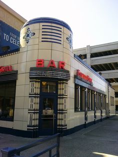 the outside of a building that has a bar on it