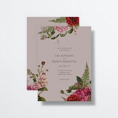 a wedding card with flowers and greenery on the front is shown in pink tones