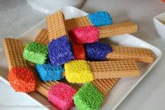 there are waffles with colored frosting on them