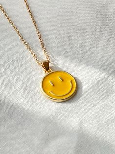 Smiley face charm necklace, cute and trendy, great for everyday wear! Great gift for friends and family :) SIZE ♥ length: 16 inches - 19 inches ♥ lobster clasp ♥ charm dimension: 0.6 inches SHIPPING TIME Fast shipping within 1 -3 days! Your necklace will come shipped in a white gift box <3 Smile Necklace, World Map Necklace, Necklace Friendship, World Necklace, Yellow Smiley Face, Friendship Necklace, Face Necklace, Necklace Cute, Map Necklace