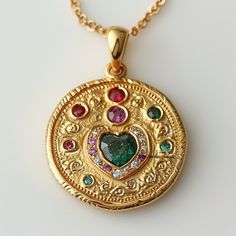 14k Gold Multi Gemstone Disc Pendant, Gold Mandala Heart Round Pendant, Multi Stone Mandala Heart Disc Pendant, Designer Gemstone Pendant ♦️ ITEM     D E T A I L S ♦️ ✦ Name : Heart Disc Pendant ✦ Metal : 925 Silver ✦ Size : 25MM ✦ Stone : Multi gemstone                                                                                 SIXTH SENSE JEWELS ✦ Our all design are made to order. We need 6 to 8 days for making and delivery to depend on the shipping method you select. ✦Product & gemstone weight may vary from actual products. ✦All are designed and handmade in-house by me and team with precision, Perfect craftsmanship and strong interest! ✦We are continuously listing new products in our store. So keep coming back to see more great updates in the store. ✦Wholesale orders With Custom are Gold Pendant Heart Necklace With Gemstone, Gold Heart Necklace With Gemstone For Anniversary, Gold Multi-stone Necklace For May Birthstone, Heart-shaped Multi-stone Necklace Gift, Heart-shaped Multi-stone Necklace For Gift, Anniversary Heart Necklace With 17 Jewels, Heart Pendant Multi-stone Jewelry Gift, Multi-stone Heart Pendant Jewelry As Gift, Mandala Heart