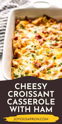 cheesy casserole with ham in a white baking dish on a table