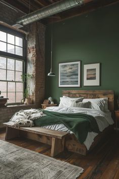 a bedroom with green walls and wooden furniture in the corner, along with large windows