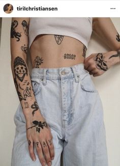 a woman with many tattoos on her arms