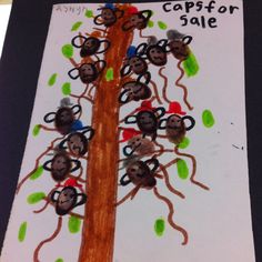 an art project with monkeys on a tree and caption capsfor sale written below