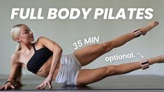 a woman is doing a full body pilates on the floor with her legs spread out