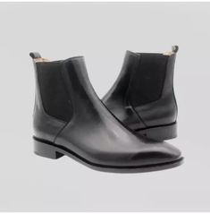 Introducing our Men Black Leather Handmade Chelsea Boots, the epitome of sophistication and style. These Formal Leather Ankle Boots are meticulously crafted to perfection, making them the perfect addition to any gentleman's wardrobe.  Made from the finest quality leather, these boots exude luxury and durability. The upper is crafted from genuine leather, ensuring a sleek and polished appearance. The soft calf leather lining provides ultimate comfort, allowing you to wear these boots all day without any discomfort.  The sole of these boots is also made from genuine leather, ensuring a firm grip and stability on any surface. The heel is also crafted from genuine leather, adding a touch of elegance to the overall design. We understand that everyone has their own unique style, which is why we Business Boots, Gentleman's Wardrobe, Dress Business, Modern Gentleman, Mens Shoes Boots, Leather Ankle Boots, Formal Dress, Leather Handmade, Boots Men