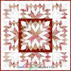 a red and white quilted square with an intricate design on the center, surrounded by dots