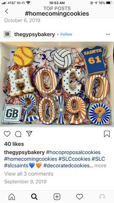 a box filled with cookies that are decorated like numbers and baseballs on top of each other