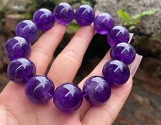 Material:Purple Amethyst Quartz beads size :  18mm quantity: one strand  6mm approx 29 pcs one strands 7mm approx25 pcs one strands 8mm approx 22 pcs one strands 9mm approx 21pcs one strands 10mm approx 19 pcs one strands 11mm approx 18pcs one strands 12mm approx 16 pcs one strands 13mm approx 16 pcs one strands 14mm approx 15 pcs one strands 15mm approx 14pcs one strands 16mm approx 14 pcs one strands 17mm approx 13pcs one strands 18mm approx 13pcs one strands 19mm approx 12pcs one strands 20mm Purple Beaded Bracelets With 8mm Beads, Purple Crystal Bracelet With Gemstone Beads, Purple Bracelets With 8mm Round Beads, Purple Polished Beads Bracelet, Purple Amethyst Round Beads Crystal Bracelet, Purple Bracelets With Polished Beads, Purple Amethyst Round Beads Bracelet, Hand-strung Purple Crystal Round Bracelet, Purple Hand-strung Crystal Round Bracelet