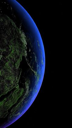 the earth from space showing green vegetation and blue water on its surface, with dark background