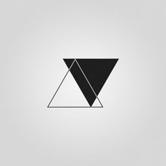 a black and white triangle on a gray background