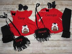 Georgia Short Set, Georgia Bulldog Short Outfit, Birthday Outfit Shorties Set 12/18M 18/24M 2T 3T 4T, Monogram Dawg Outfit, Georgia Football, Georgia Pants Outfit, Purse A red pearl short sleeve top that has been paired with black ruffle shorts.  Also you can pick the pants set - Long Sleeve Red top that has been paired with black icing pants.  This would be great for your Georgia Bulldog fans.  Your choice to have it monogrammed or not...Last picture shows the monogram choices... I have the fol Georgia Bulldog Leggings, Toddler Ga Bulldog Shirt, Black Ruffle Shorts, Black Icing, Georgia Dawgs, Georgia Bulldog, Outfit Pants, Embroidery Boutique, Georgia Football