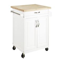 a white kitchen island with wooden top on casteors and two drawers, in front of a white background