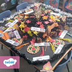 a table topped with lots of different types of cookies and decorations on top of it