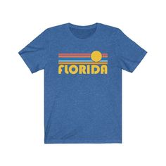 "I'm able to customize some of my items with text for your family trip, special occasion, etc. If you'd like to learn more please message me before ordering! Thank you, Ben Please double check the size chart below prior to ordering** This soft jersey unisex Florida t-shirt, is perfect for a women or man and is a great Florida t shirt. It is 100% soft cotton, runs true to size and comes in a variety of colors! You will love wearing this t-shirt all over Florida, with it's soft cotton feel. Size C Retro Hawaii, Colorado Shirt, Tennessee Shirt, California Sweatshirt, Merchandise Ideas, California Shirt, Texas Shirts, Shirt Inspiration, Retro Sunset