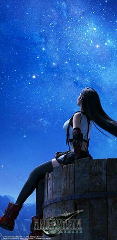 a woman sitting on top of a barrel looking up at the stars in the sky